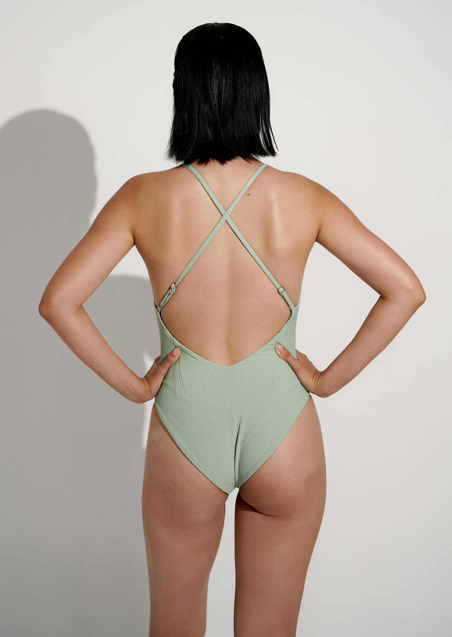 Green cross back style swimsuit one piece